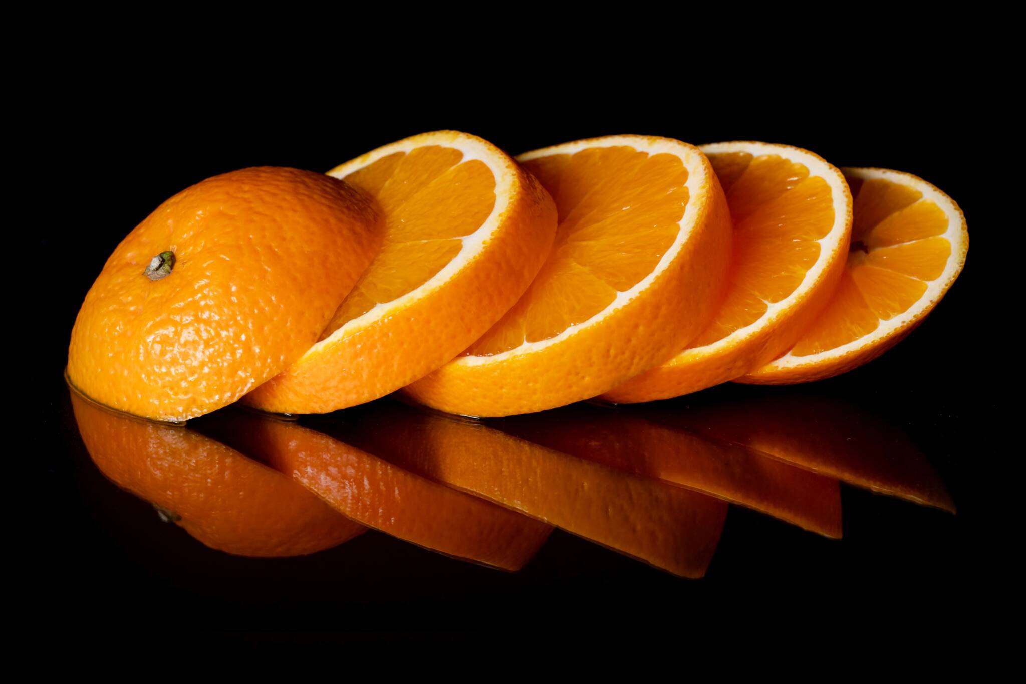 Fotografía de producto naranja en rodajas